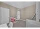 Cozy bedroom with gray carpet and playful decor, featuring a built-in bunk bed structure at 3195 Hazy Hills Ave, Henderson, NV 89052