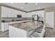Bright kitchen with granite countertops and stainless steel appliances at 3195 Hazy Hills Ave, Henderson, NV 89052