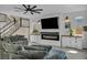 Spacious living room with large TV and fireplace at 3195 Hazy Hills Ave, Henderson, NV 89052