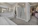 Bright bathroom with large vanity, walk-in shower, and opens to spacious walk-in closet at 3195 Hazy Hills Ave, Henderson, NV 89052