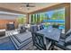 Beautiful patio featuring outdoor dining and lounging options with a view of the pool at 3195 Hazy Hills Ave, Henderson, NV 89052