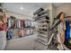 Large walk-in closet featuring lots of hanging storage space and shelving for storage at 3195 Hazy Hills Ave, Henderson, NV 89052