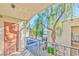Balcony with gray metal railing showcasing the outside neighborhood at 3221 Jericho St # D, Las Vegas, NV 89102