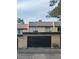 Two-story townhome featuring a private garage and stucco exterior at 3226 Weber Ct, Las Vegas, NV 89121