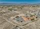 This aerial shows the vast and fenced in desert landscape at 3251 S Parkridge Ave, Pahrump, NV 89048