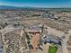 Sweeping aerial view highlighting the property's desert landscape and residential building at 3251 S Parkridge Ave, Pahrump, NV 89048