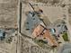 Expansive aerial view reveals a desert property featuring well and a neighboring property at 3251 S Parkridge Ave, Pahrump, NV 89048
