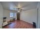 Spare bedroom featuring a wood laminate floor, window, and an armoire at 3251 S Parkridge Ave, Pahrump, NV 89048