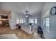 Bonus room with large windows, granite counters, and a ceiling fan, perfect for an office or craft space at 3251 S Parkridge Ave, Pahrump, NV 89048