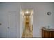 Long hallway featuring storage and closet space that connects the main areas of the residence at 3251 S Parkridge Ave, Pahrump, NV 89048