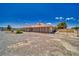 Long screened in patio overlooking the large lot at 3251 S Parkridge Ave, Pahrump, NV 89048
