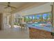 Outdoor dining area with desert landscaping and a resort style pool at 328 Hedgehope Dr, Las Vegas, NV 89183