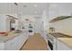 Spacious kitchen with modern appliances, a large island, and open shelving at 328 Hedgehope Dr, Las Vegas, NV 89183