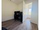 Functional bedroom with a computer setup, featuring modern floors and ample space at 3508 Harbor Tides St, Las Vegas, NV 89147