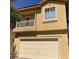 Two-story home boasting a two-car garage and a quaint balcony at 3508 Harbor Tides St, Las Vegas, NV 89147