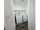 Efficient laundry area with modern machines and practical shelving at 3508 Harbor Tides St, Las Vegas, NV 89147