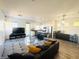 Open-concept living room and kitchen area with modern design at 3508 Harbor Tides St, Las Vegas, NV 89147