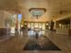 Spacious living room with high ceilings, fireplace, and travertine flooring at 3508 Harbor Tides St, Las Vegas, NV 89147