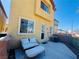 Inviting patio area with comfortable seating and views of the backyard at 3508 Harbor Tides St, Las Vegas, NV 89147