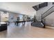 Spacious game room with a pool table, sleek floors, and ample natural light, perfect for entertainment at 352 Angels Trace Ct, Las Vegas, NV 89148