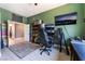 Stylish home office with modern desk setup, custom shelving, and neutral decor at 352 Angels Trace Ct, Las Vegas, NV 89148