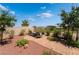 Outdoor lounge featuring comfortable seating, a brick paver patio, and manicured landscaping at 352 Angels Trace Ct, Las Vegas, NV 89148