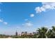 Breathtaking view of the Las Vegas skyline with a clear blue sky and scattered clouds at 352 Angels Trace Ct, Las Vegas, NV 89148