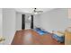 Empty bedroom with ceiling fan, window, and wood-look flooring at 3591 Gloucester Gate St, Las Vegas, NV 89122