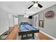 The game room is perfect for entertaining, with a pool table and comfortable seating at 3591 Gloucester Gate St, Las Vegas, NV 89122