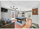 Entertain guests in the game room, complete with a pool table and dart board at 3591 Gloucester Gate St, Las Vegas, NV 89122
