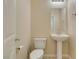 Clean half bathroom features a pedestal sink and tile floors at 368 Calabria Beach St, Henderson, NV 89015