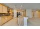 Modern kitchen featuring tile floors, stainless steel appliances, and granite countertops at 368 Calabria Beach St, Henderson, NV 89015