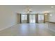 Spacious living room featuring tiled floors, ample natural light, and modern fixtures at 368 Calabria Beach St, Henderson, NV 89015