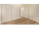 Bedroom showcases wood-look floors and closet with sleek sliding doors at 3748 Silent Hill Dr, Las Vegas, NV 89147