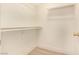 Spacious walk-in closet with shelving and clothing rods, ideal for organized storage at 3748 Silent Hill Dr, Las Vegas, NV 89147