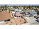 Charming front yard with desert landscaping, solar panels, and an attached two car garage at 3748 Silent Hill Dr, Las Vegas, NV 89147