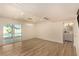 Bright living area featuring recessed lighting, modern fixtures, access to the pool, and an adjacent renovated bathroom at 3748 Silent Hill Dr, Las Vegas, NV 89147