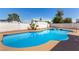 Inviting backyard featuring a refreshing pool and beautifully landscaped surroundings at 3748 Silent Hill Dr, Las Vegas, NV 89147
