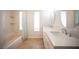 Bright bathroom with double vanity, updated fixtures and a shower/tub combo at 3790 W Moberly Ave, Las Vegas, NV 89139