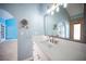Bathroom with an extended vanity countertop, and sinks and stylish decor at 3790 W Moberly Ave, Las Vegas, NV 89139