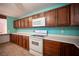 Kitchen featuring updated appliances, oak cabinetry, and bright lighting at 3790 W Moberly Ave, Las Vegas, NV 89139