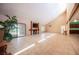 Bright living room with fireplace, sliding glass doors, and views of outdoor area at 3790 W Moberly Ave, Las Vegas, NV 89139