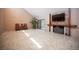 Comfortable living area features fireplace, large windows, and views of backyard at 3790 W Moberly Ave, Las Vegas, NV 89139