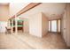 Bright living room with open floor plan, neutral walls, and access to the kitchen at 3790 W Moberly Ave, Las Vegas, NV 89139