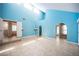 Bright primary bedroom with high ceilings, light blue walls, and tiled floors at 3790 W Moberly Ave, Las Vegas, NV 89139