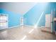Spacious primary bedroom with high ceilings, blue walls, and lots of natural light at 3790 W Moberly Ave, Las Vegas, NV 89139