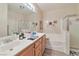 Spacious bathroom with double sink vanity, soaking tub, and separate shower at 3975 N Hualapai Way # 121, Las Vegas, NV 89129