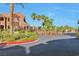 Community entry gate surrounded by desert landscaping at 3975 N Hualapai Way # 121, Las Vegas, NV 89129
