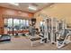 Community gym featuring multiple machines and free weights at 3975 N Hualapai Way # 121, Las Vegas, NV 89129