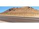 Desert landscape near a road and desert mountain at 3975 N Hualapai Way # 121, Las Vegas, NV 89129